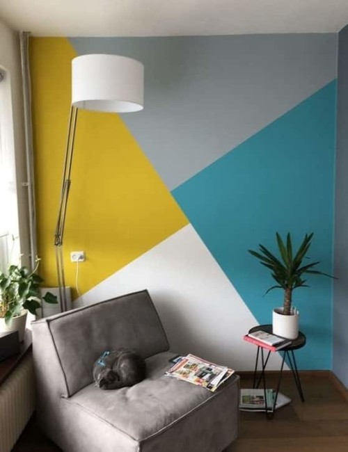 Pared pintada con diferentes colores con efecto tridimensional