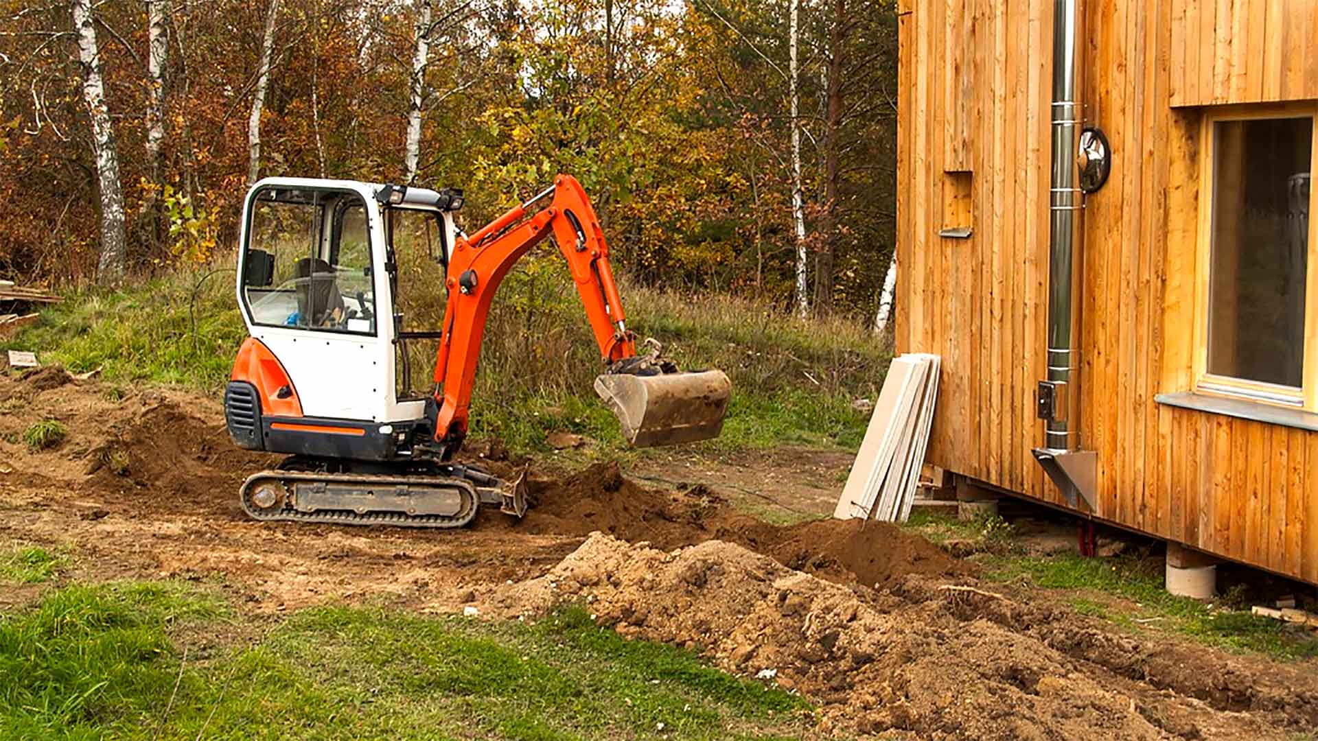 Excavar alrededor de la casa para construir una adición